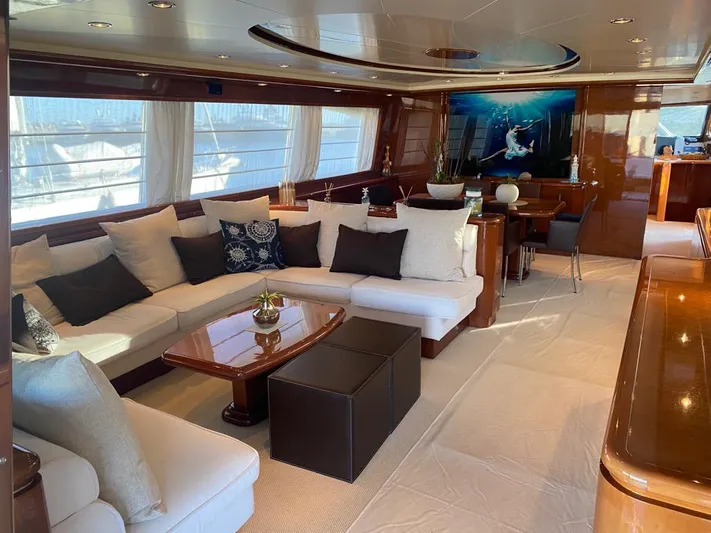 My Sons Yacht Photos Pics Luxurious interior of a 2008 Falcon 86 yacht with elegant seating and decor.