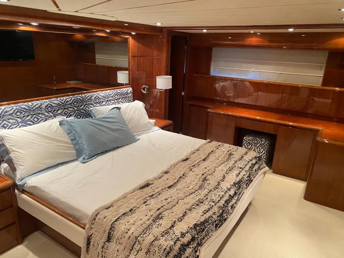 My Sons Yacht Photos Pics Luxurious bedroom interior on 2008 Falcon 86 yacht with elegant wood finishes.