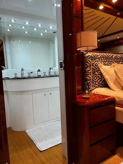 My Sons Yacht Photos Pics Luxurious Falcon 86 yacht interior, featuring elegant bedroom and modern bathroom, 2008 model.