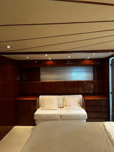My Sons Yacht Photos Pics Luxurious cabin interior of 2008 Falcon 86 yacht with elegant wood paneling.