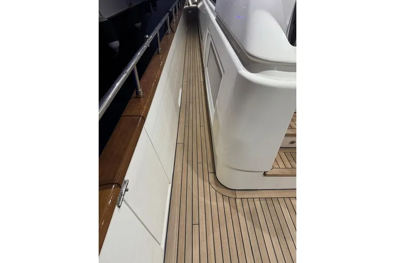 My Sons Yacht Photos Pics Luxurious Falcon 86 yacht deck with sleek wood finish, 2008 model.