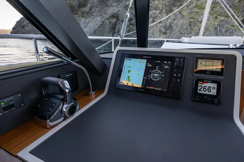 In Stock - W / Warranty Yacht Photos Pics 2024 Moody 41ds yacht cockpit with advanced navigation system and controls.