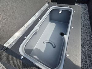 Livewell compartment in 2025 Tracker Panfish™ 17 boat, featuring durable construction and efficient drainage.