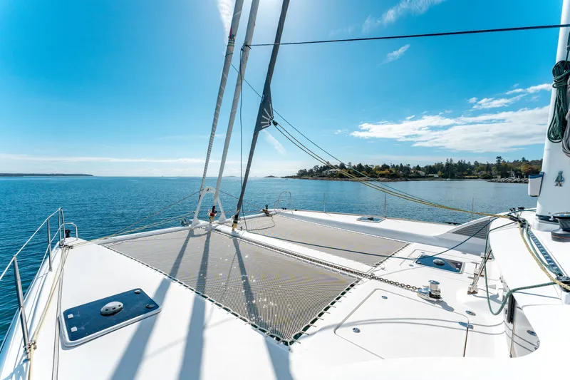 Wikiwiki Yacht Photos Pics Outremer 5X 2018 catamaran sailing on a sunny day with clear blue skies.