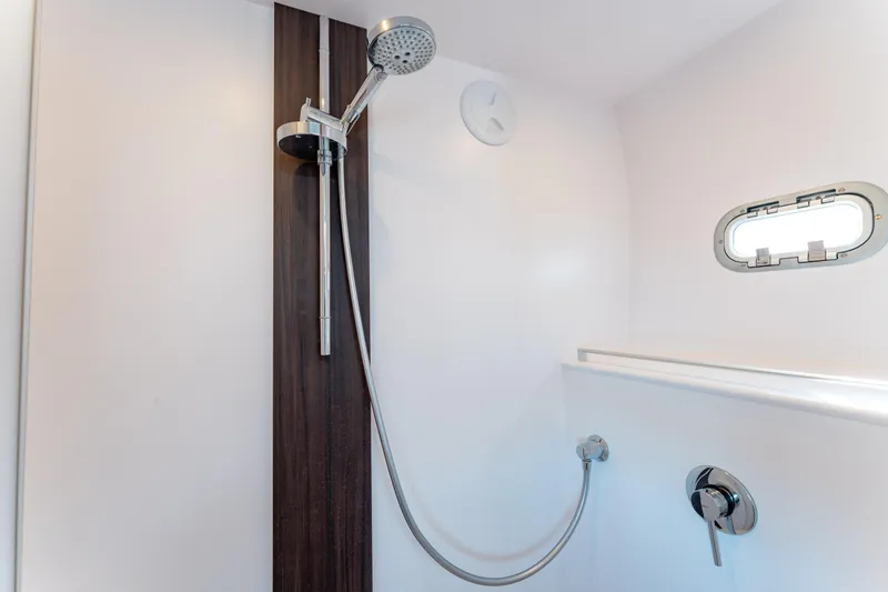 Wikiwiki Yacht Photos Pics Modern shower in 2018 Outremer 5X yacht, featuring sleek design and chrome fixtures.