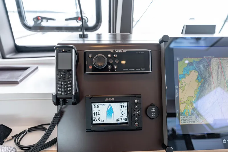 Wikiwiki Yacht Photos Pics Control panel of a 2018 Outremer 5X yacht with navigation and communication equipment.