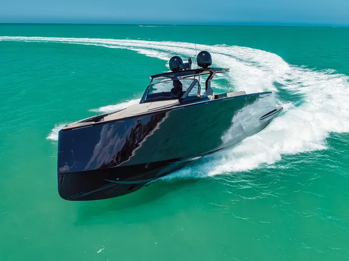 Ciao Yacht Photos Pics 2023 Pardo Yachts 50 Pardo cruising on turquoise waters, showcasing sleek design and performance.