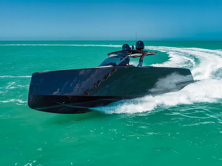 Ciao Yacht Photos Pics 2023 Pardo Yachts 50 cruising on turquoise waters under clear blue skies.