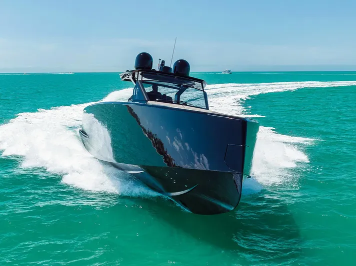 Ciao Yacht Photos Pics 2023 Pardo Yachts 50 Pardo cruising on turquoise waters, showcasing sleek design and performance.