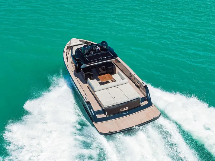 Ciao Yacht Photos Pics 2023 Pardo Yachts 50 Pardo cruising on turquoise waters, rear view.