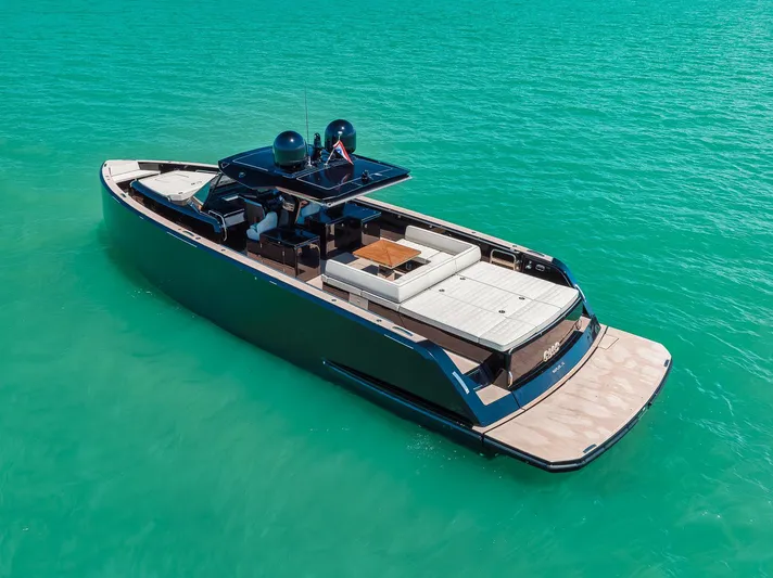 Ciao Yacht Photos Pics 2023 Pardo Yachts 50 Pardo cruising on turquoise water, showcasing sleek design and luxury features.