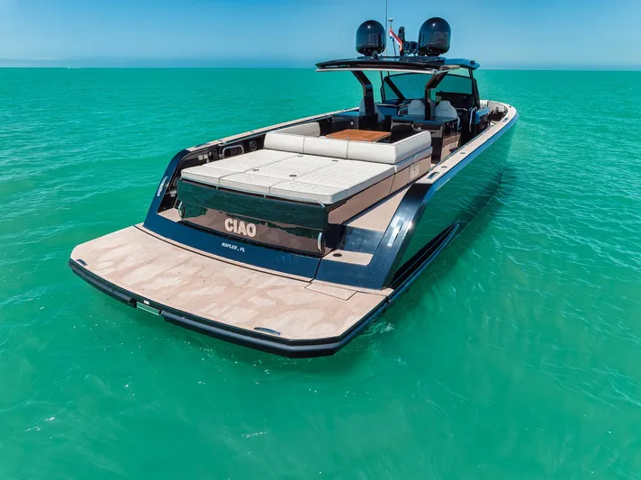 Ciao Yacht Photos Pics 2023 Pardo Yachts 50 Pardo luxury yacht on turquoise water, rear view.