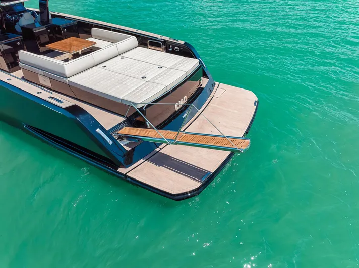 Ciao Yacht Photos Pics 2023 Pardo Yachts 50 Pardo luxury yacht with spacious deck on turquoise water.