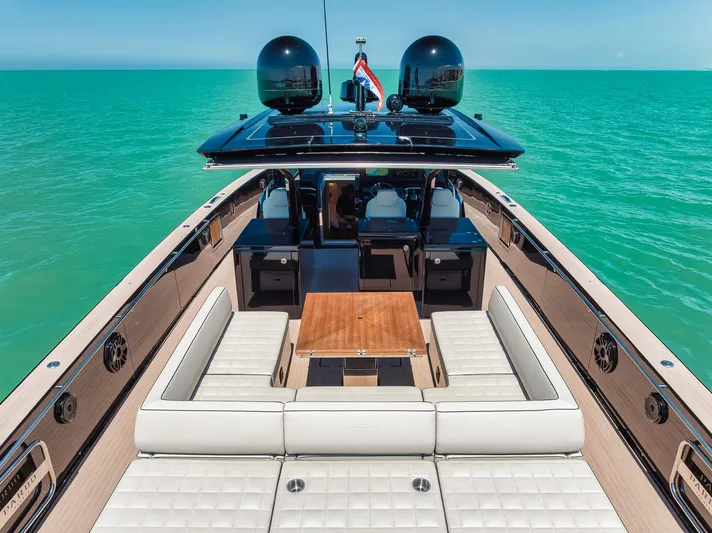 Ciao Yacht Photos Pics 2023 Pardo Yachts 50 Pardo luxury yacht interior with seating and table on turquoise water.