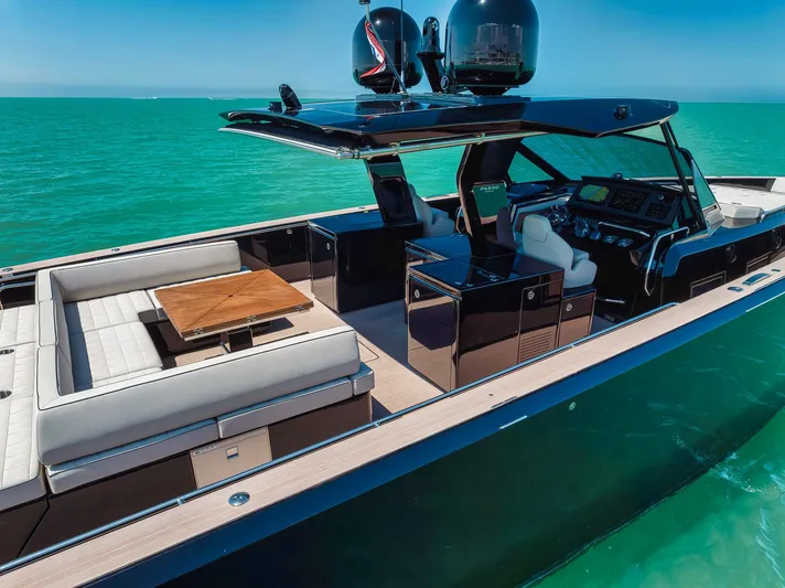 Ciao Yacht Photos Pics 2023 Pardo Yachts 50 Pardo luxury yacht on turquoise water, featuring sleek design and spacious deck.