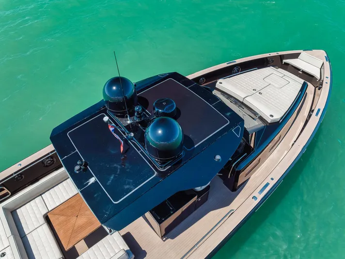 Ciao Yacht Photos Pics 2023 Pardo Yachts 50 Pardo on turquoise water, featuring sleek design and spacious deck.