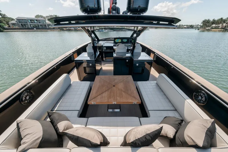 Ciao Yacht Photos Pics Luxurious 2023 Pardo Yachts 50 Pardo with elegant seating and modern design on tranquil water.