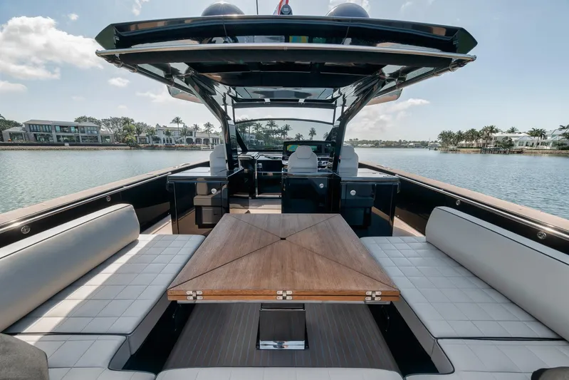 Ciao Yacht Photos Pics 2023 Pardo Yachts 50 Pardo luxury yacht interior with elegant seating and wooden table.