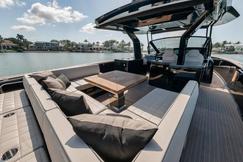 Ciao Yacht Photos Pics Luxurious 2023 Pardo Yachts 50 Pardo with elegant seating and scenic waterfront view.