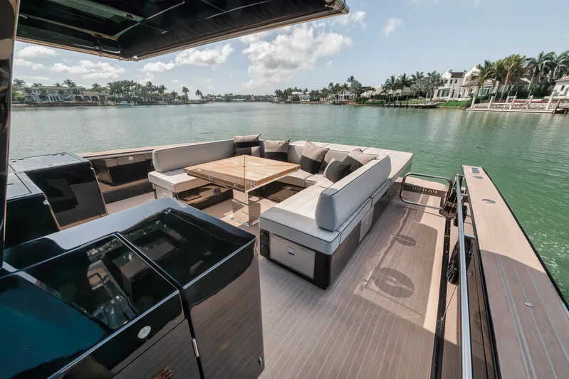Ciao Yacht Photos Pics Luxurious 2023 Pardo Yachts 50 Pardo with elegant seating and scenic waterfront view.