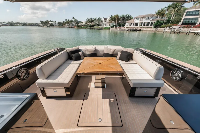 Ciao Yacht Photos Pics Luxurious 2023 Pardo Yachts 50 Pardo deck with elegant seating and scenic waterfront view.