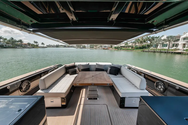 Ciao Yacht Photos Pics Luxurious 2023 Pardo Yachts 50 Pardo with elegant seating and scenic waterfront view.