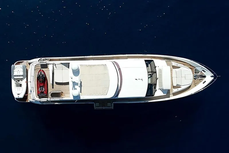  Yacht Photos Pics Aerial view of 2016 Princess 88 Motor Yacht on calm blue water.