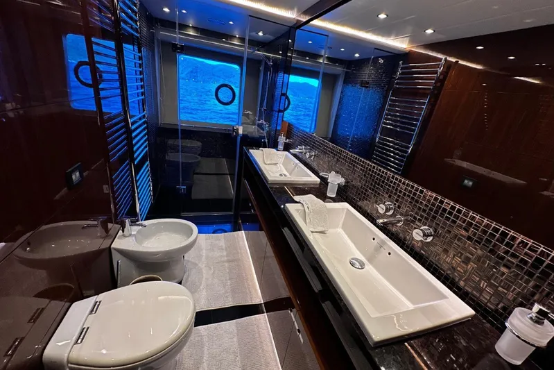  Yacht Photos Pics Luxurious bathroom in 2016 Princess 88 Motor Yacht with dual sinks and ocean view.