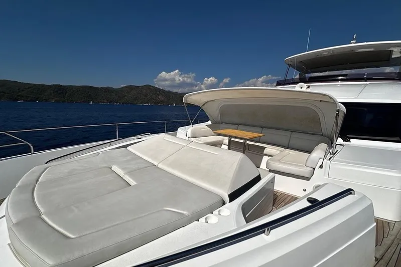  Yacht Photos Pics Luxurious 2016 Princess 88 Motor Yacht with spacious deck seating and scenic ocean view.