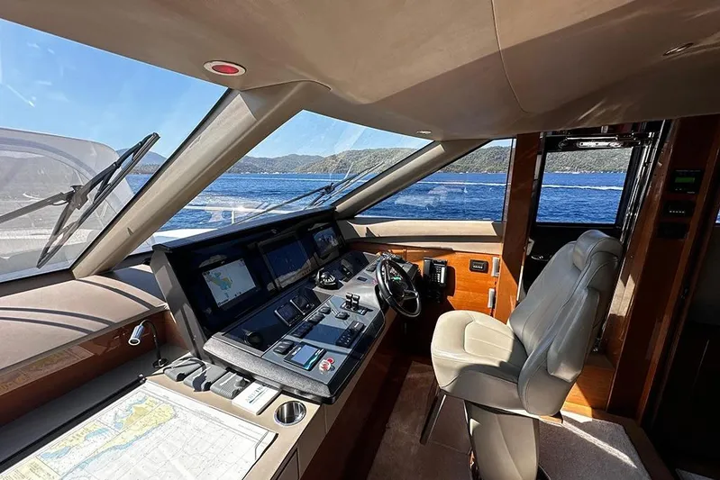  Yacht Photos Pics Interior helm of 2016 Princess 88 Motor Yacht with navigation equipment and sea view.