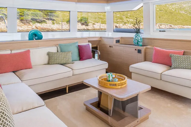  Yacht Photos Pics Manufacturer Provided Image: Luxurious interior of 2025 Lagoon 60 yacht with modern decor and comfortable seating.