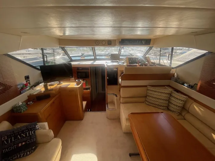  Yacht Photos Pics Interior of a 1991 Princess 388 yacht with cozy seating area.