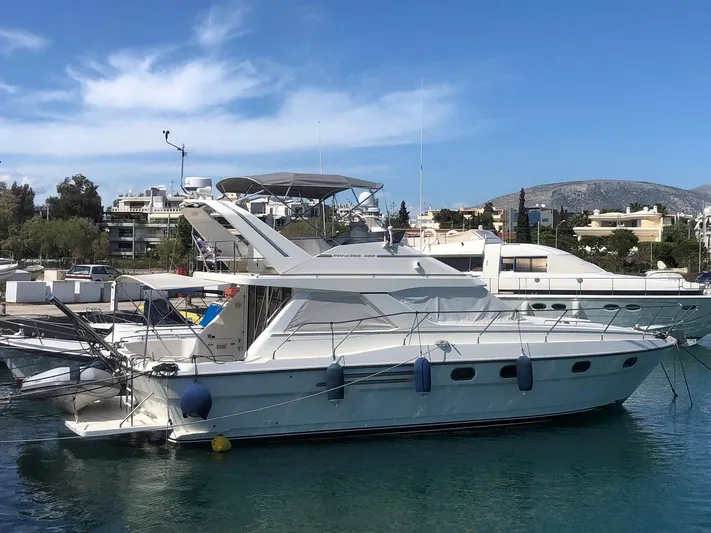  Yacht Photos Pics 1991 Princess 388 luxury yacht docked in harbor.