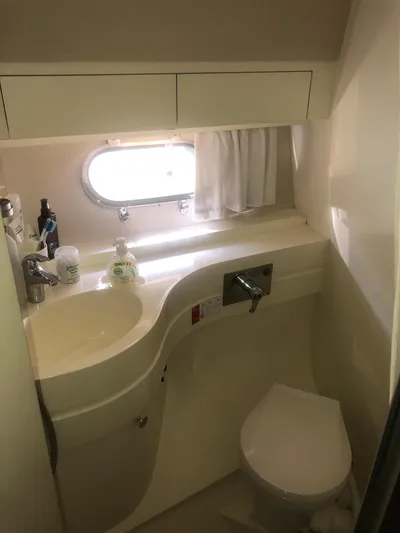  Yacht Photos Pics Bathroom of a 1991 Princess 388 yacht with sink and toilet.