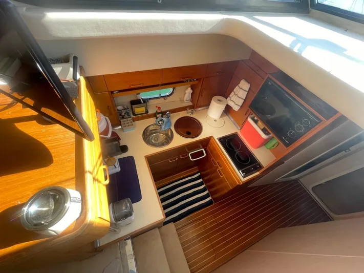  Yacht Photos Pics Compact kitchen on a 1991 Princess 388 yacht.