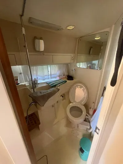  Yacht Photos Pics Bathroom of a 1991 Princess 388 yacht with toilet and sink.
