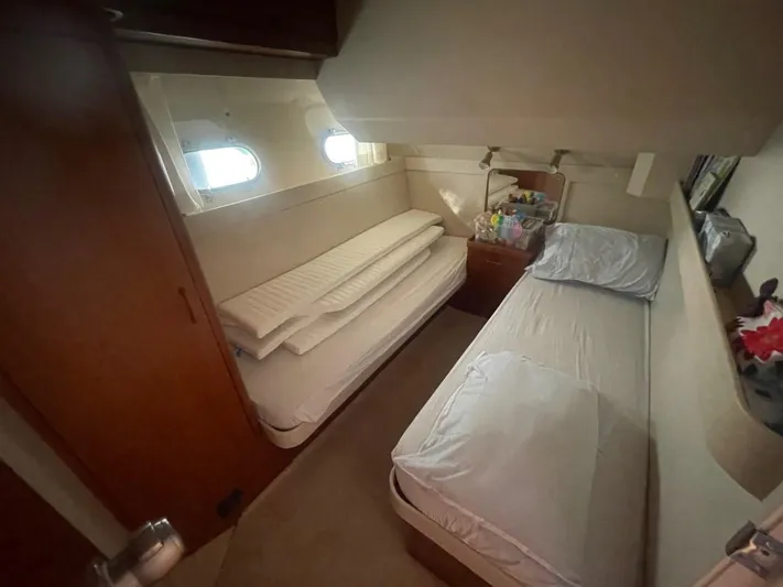  Yacht Photos Pics Interior of a 1991 Princess 388 yacht with two beds.