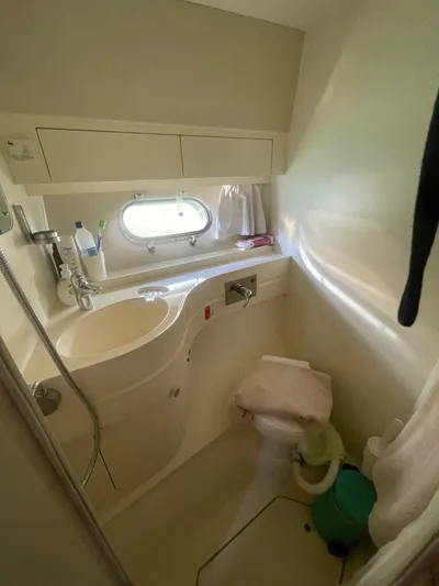  Yacht Photos Pics Bathroom of a 1991 Princess 388 yacht with sink and toilet.