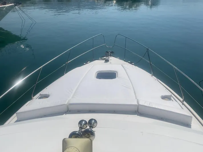  Yacht Photos Pics Bow view of a 1991 Princess 388 yacht on calm water.