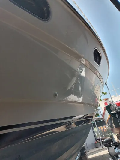  Yacht Photos Pics Side view of a 1991 Princess 388 yacht in harbor.