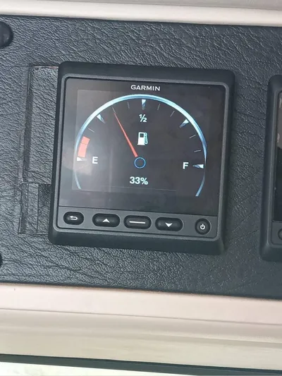  Yacht Photos Pics Garmin fuel gauge at 33% on 1991 Princess 388.
