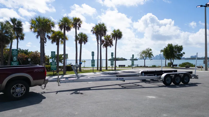  Yacht Photos Pics Trailer for 2019 Century 3200 Center Console by waterfront with palm trees and city skyline.