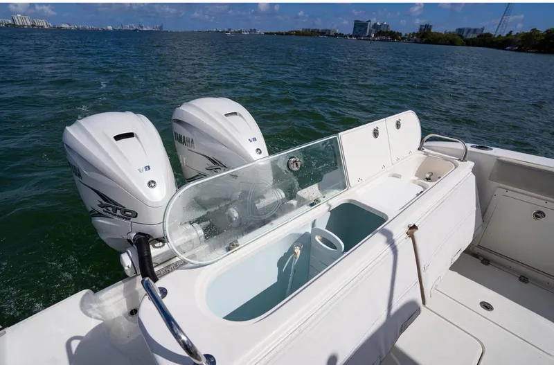  Yacht Photos Pics 2019 Century 3200 Center Console boat with twin Yamaha engines on open water.