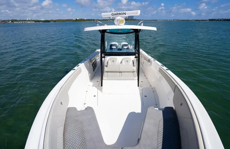  Yacht Photos Pics 2019 Century 3200 Center Console boat on open water, featuring Garmin equipment.