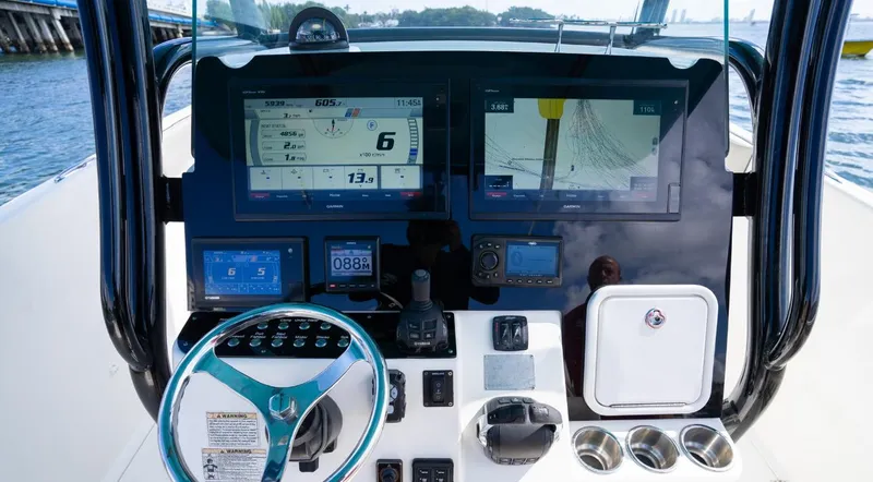  Yacht Photos Pics 2019 Century 3200 Center Console boat dashboard with advanced navigation and control systems.