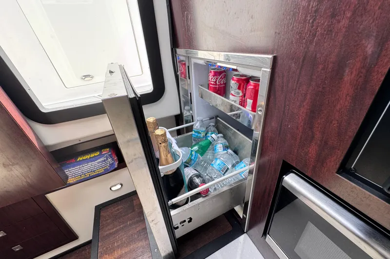 Viroque Yacht Photos Pics Mini fridge stocked with drinks on a 2021 Monterey 378 Super Express boat.