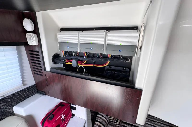 Viroque Yacht Photos Pics Interior view of 2021 Monterey 378 Super Express showcasing electrical panel and wiring.