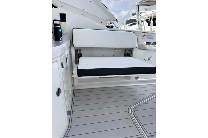 Viroque Yacht Photos Pics 2021 Monterey 378 Super Express boat interior with white seating and sleek design.