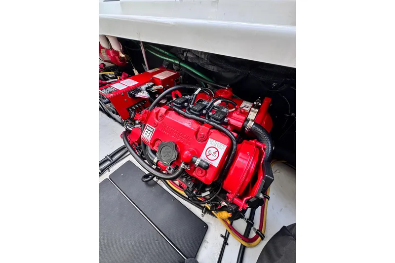 Viroque Yacht Photos Pics Engine compartment of 2021 Monterey 378 Super Express, featuring a red Westerbeke generator.