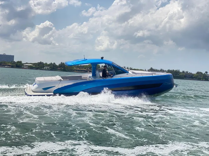  Yacht Photos Pics 2025 Nassima Yacht N40 cruising on the water under a partly cloudy sky.